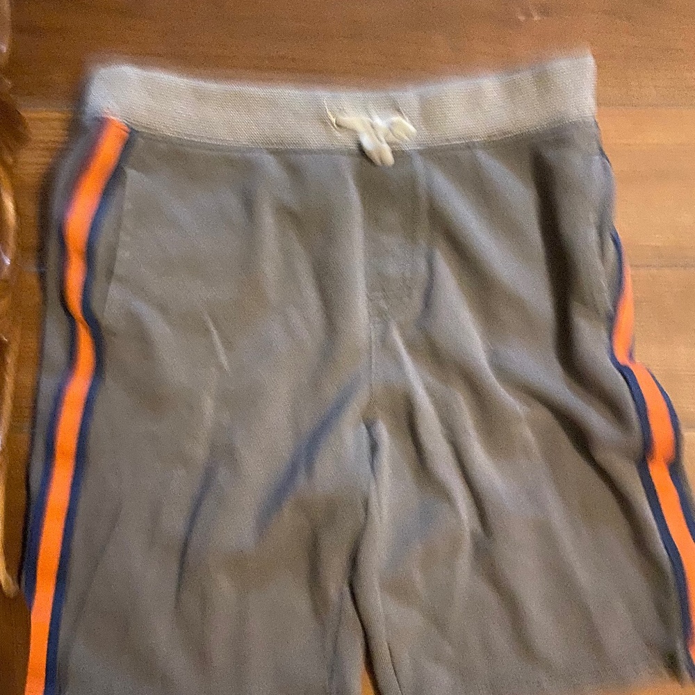 Boys pull on shorts
